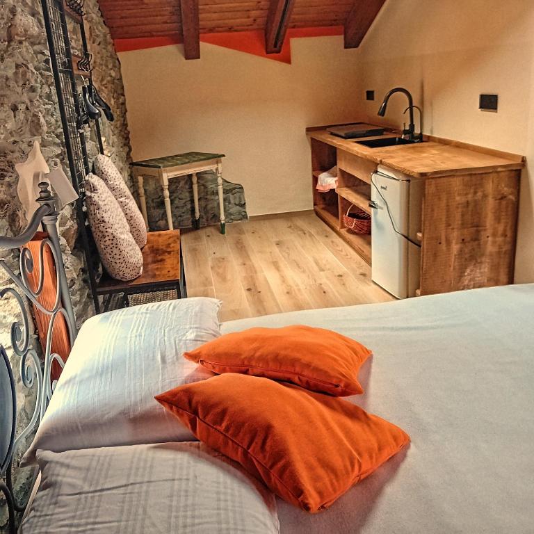 Postel nebo postele na pokoji v ubytování Le Foyer de Grand-mère