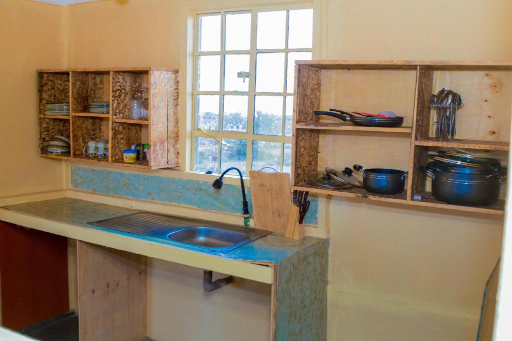 Kuchyň nebo kuchyňský kout v ubytování Little Amanya Camp