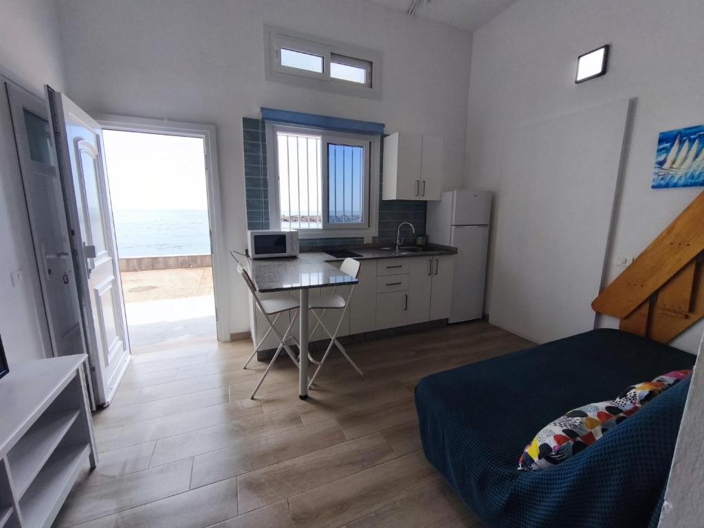 Telewizja i/lub zestaw kina domowego w obiekcie Apartamento Salinas