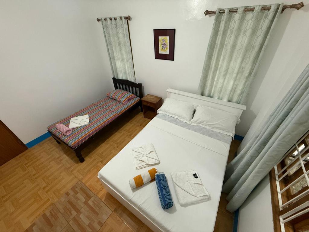 Postel nebo postele na pokoji v ubytování Casa Aureola