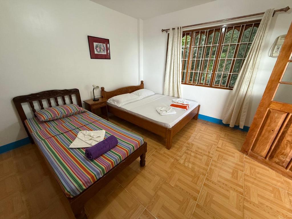 Postel nebo postele na pokoji v ubytování Casa Aureola
