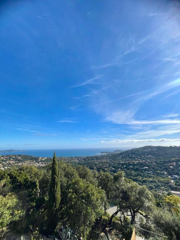 a view of the ocean from the top of a hill at Villa La Belle in Cavalaire-sur-Mer