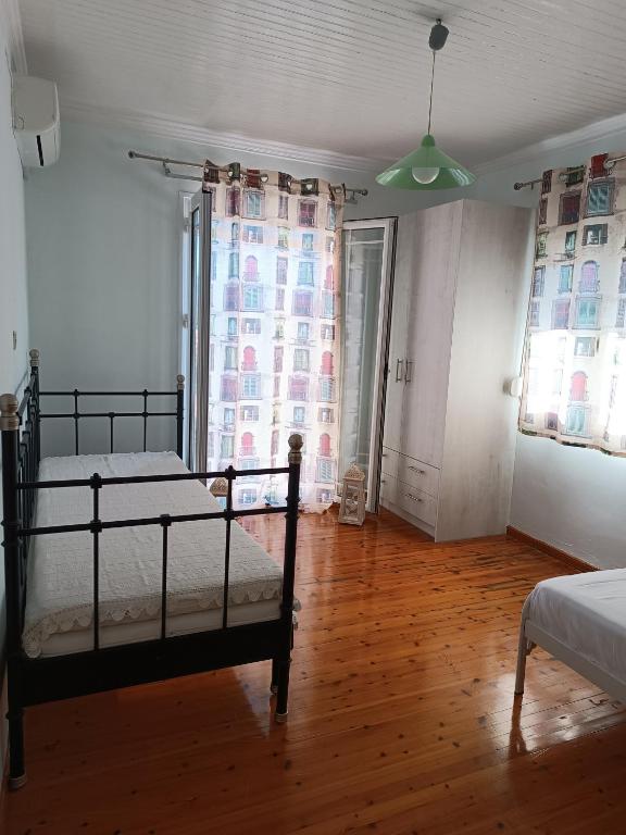 Postel nebo postele na pokoji v ubytování Xeni's House