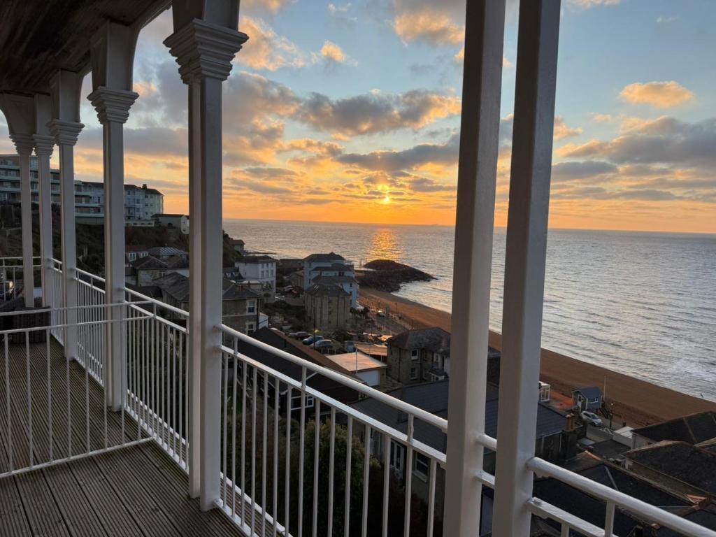 a view of the ocean from the balcony of a resort at The Wellington Hotel in Ventnor