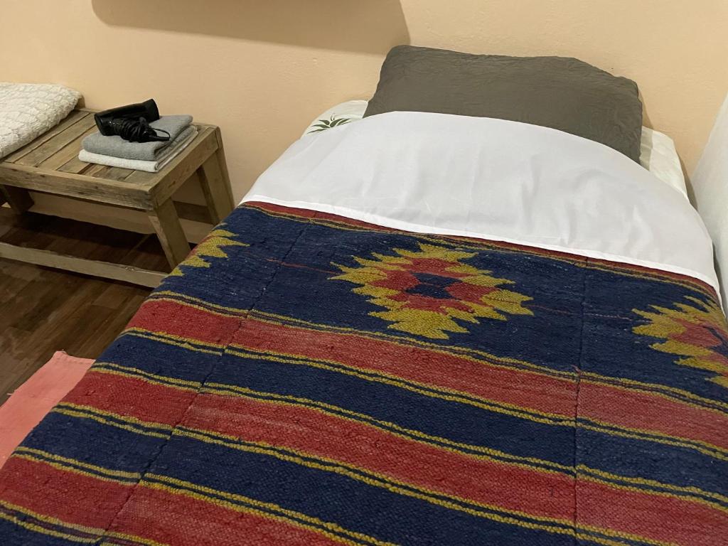 Een bed of bedden in een kamer bij Guesthouse RAMAJ