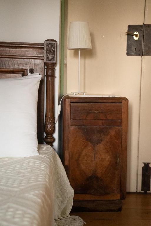 Postel nebo postele na pokoji v ubytování Agriturismo Barchessa