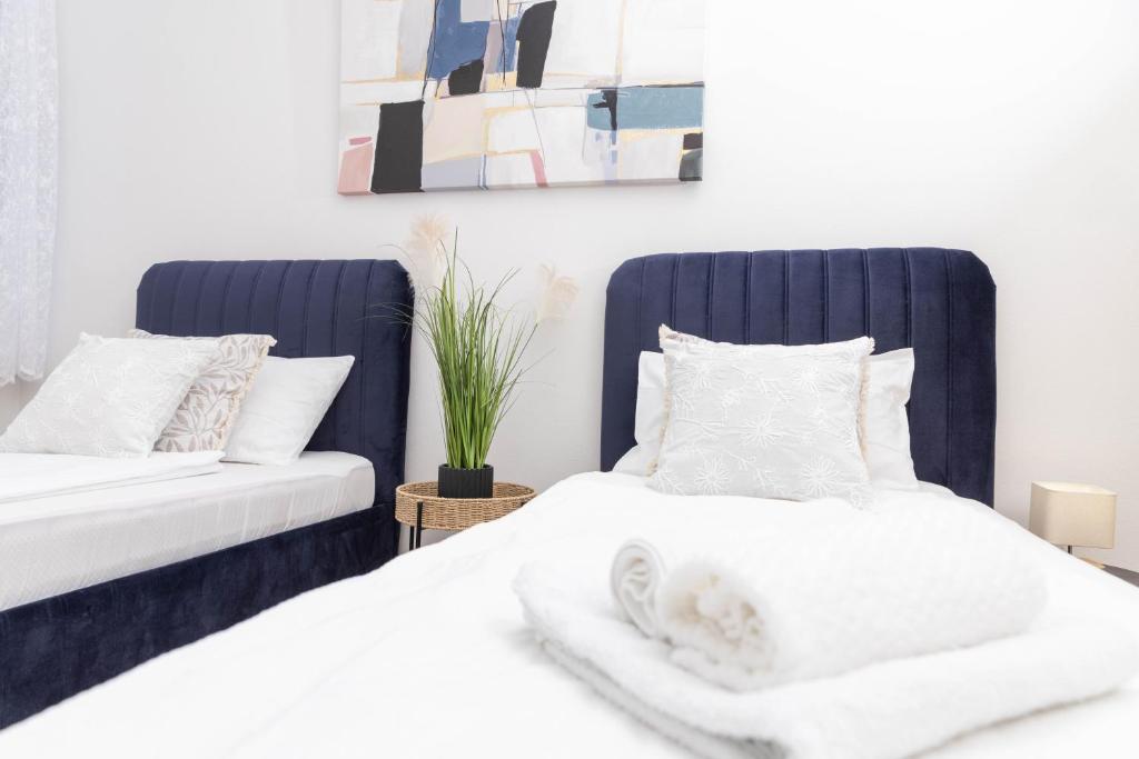 Postel nebo postele na pokoji v ubytování Apartman Tihana