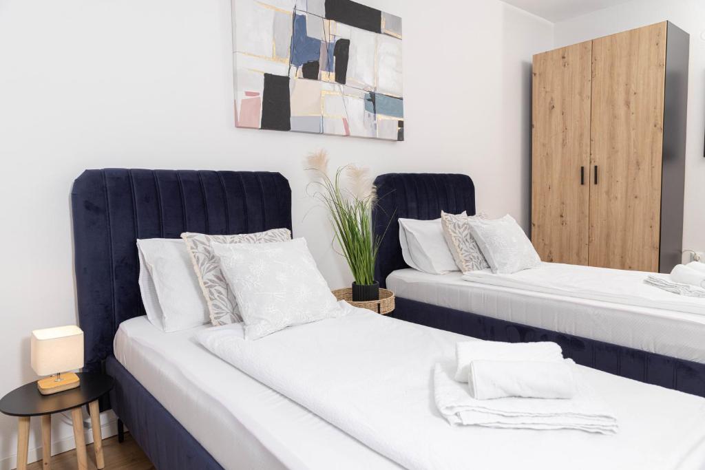 Postel nebo postele na pokoji v ubytování Apartman Tihana