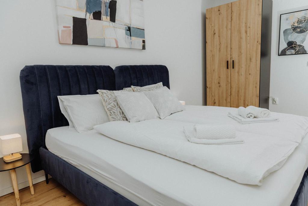 Postel nebo postele na pokoji v ubytování Apartman Tihana