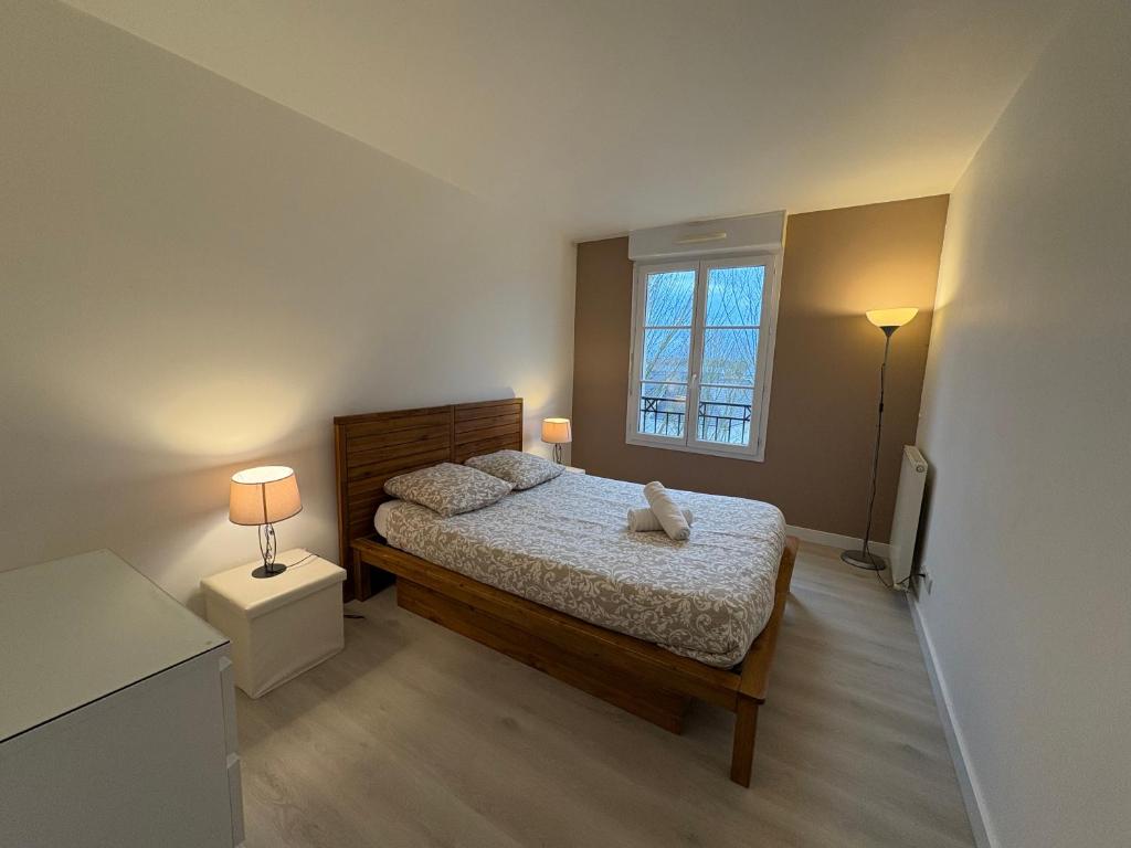 Postel nebo postele na pokoji v ubytování T5 Disney Paris/Val d’Europe