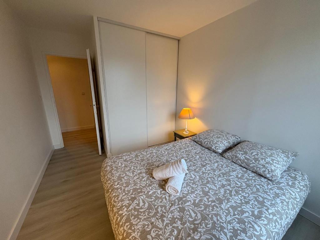 Postel nebo postele na pokoji v ubytování T5 Disney Paris/Val d’Europe