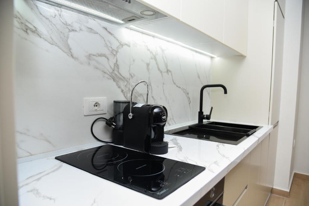 Kuchyň nebo kuchyňský kout v ubytování Seaside Grand Stay Apartment