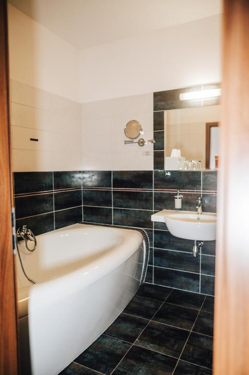 Koupelna v ubytování Hotel Elegance