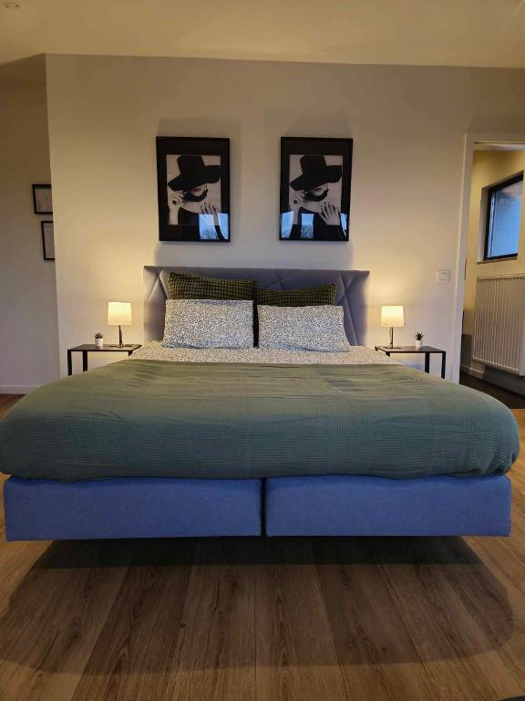 Postel nebo postele na pokoji v ubytování Orient Herent - Boetiekhotel