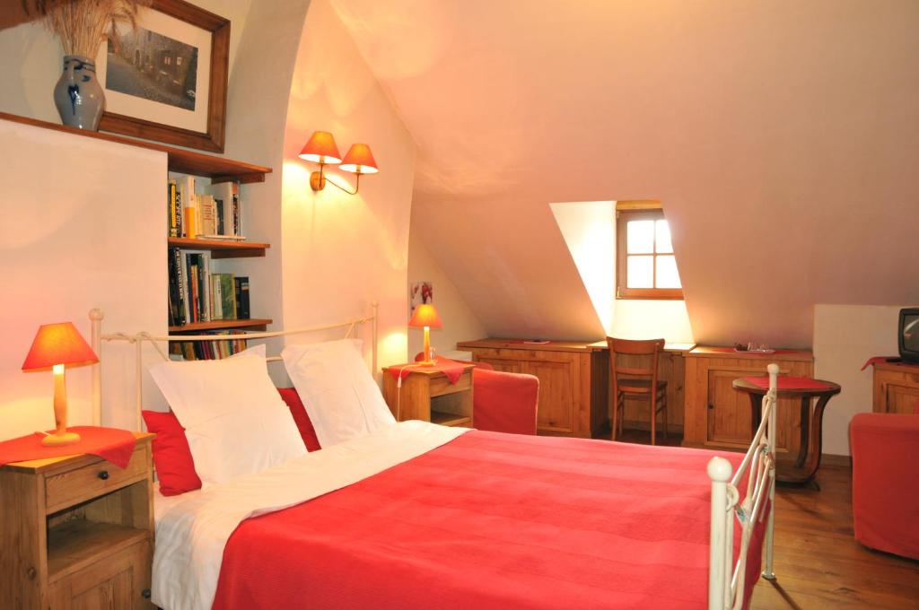 Postel nebo postele na pokoji v ubytování B&B Le Clos de la Fontaine