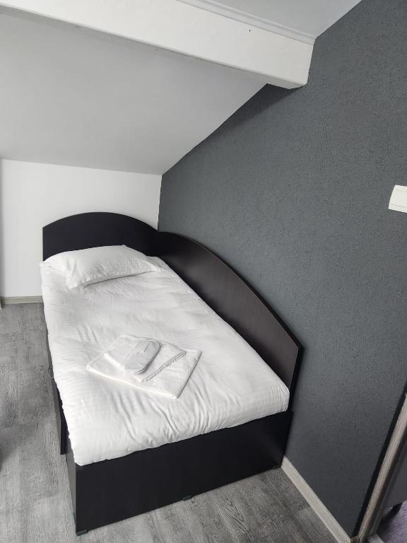 Postel nebo postele na pokoji v ubytování Casa Lupeni