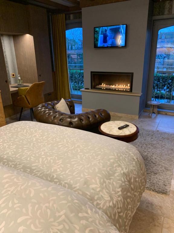 TV a/nebo společenská místnost v ubytování B&B De Rentmeesterhoeve