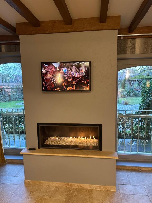 TV a/nebo společenská místnost v ubytování B&B De Rentmeesterhoeve