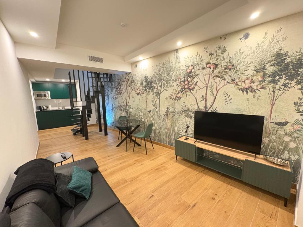 TV a/nebo společenská místnost v ubytování Ram7 Segredo Ultrassecreto Apartment Gallarate