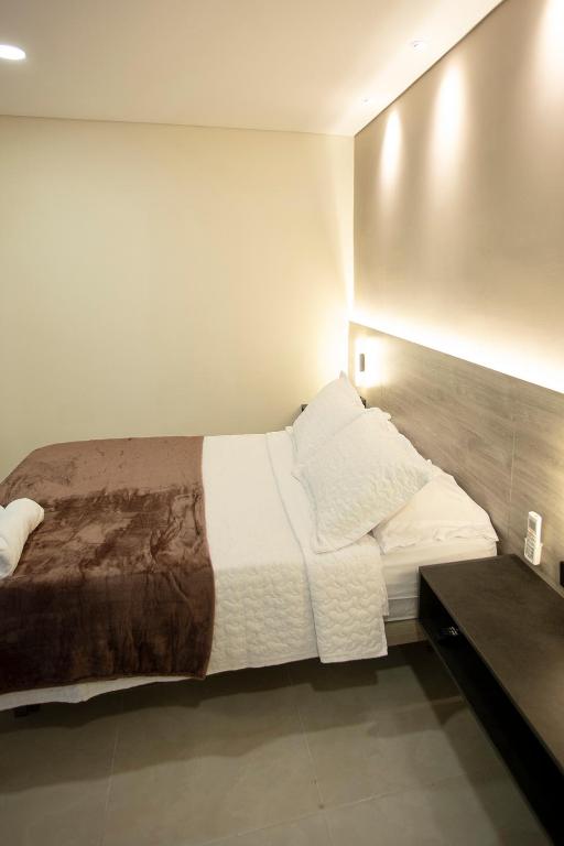 Postel nebo postele na pokoji v ubytování Hotel Gran Ester