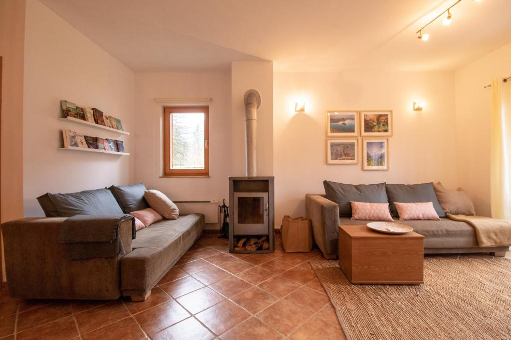Posezení v ubytování Chalet Fisherman's Cottage