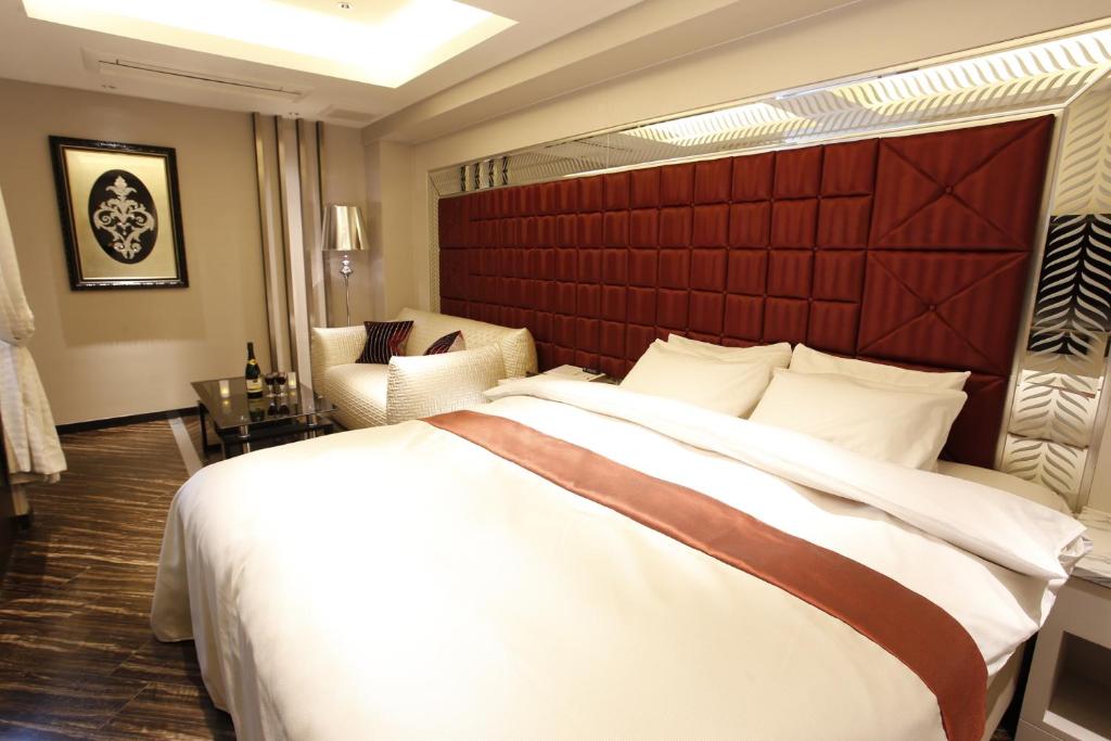Postel nebo postele na pokoji v ubytování Hotel Moana Shinjuku (Adult Only)