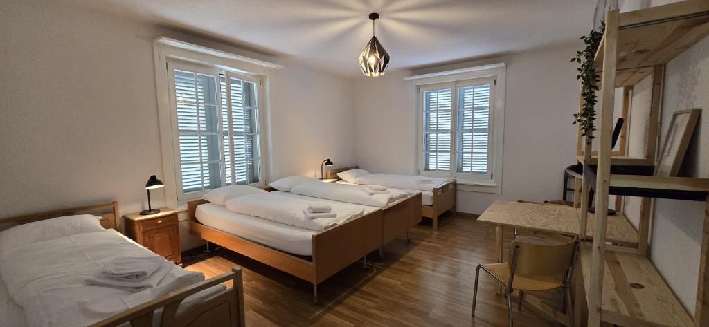 Postel nebo postele na pokoji v ubytování House of Thun Full Apartment