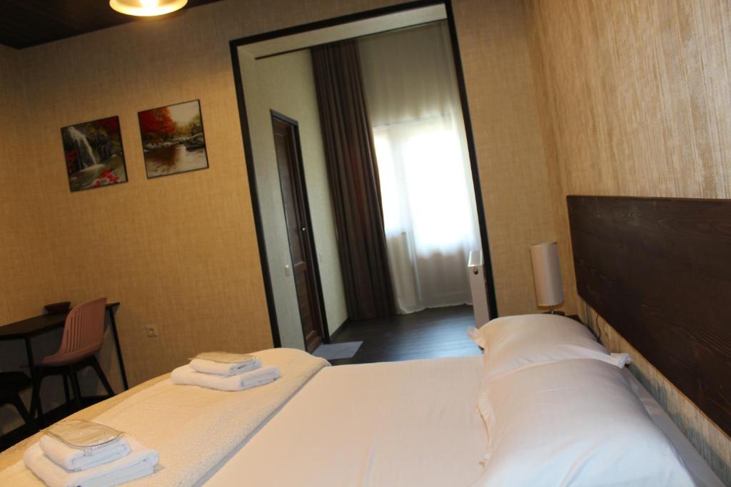 Postel nebo postele na pokoji v ubytování Hotel Eden