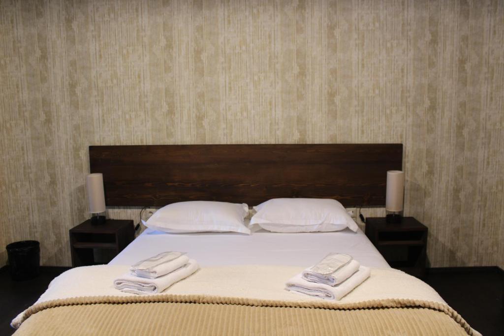Postel nebo postele na pokoji v ubytování Hotel Eden