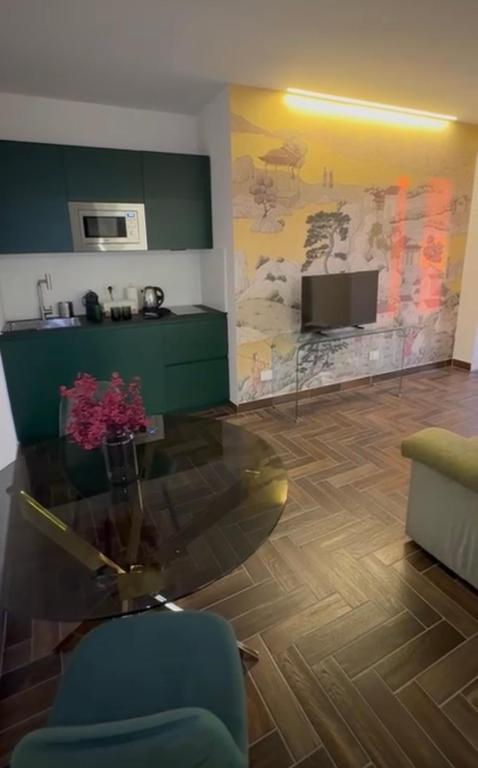 Kuchyň nebo kuchyňský kout v ubytování Ram7 Kōfuku Zen Apartment Gallarate