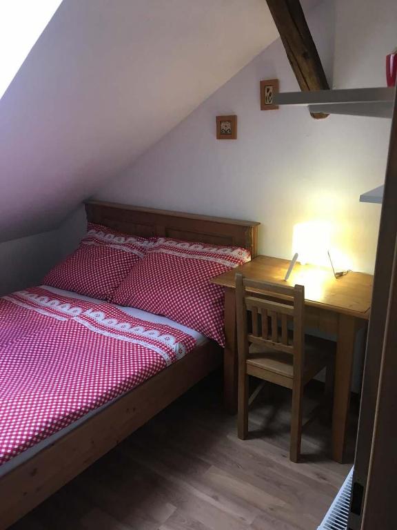 Postel nebo postele na pokoji v ubytování Roubenka u Vrabců
