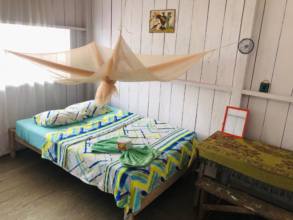 Postel nebo postele na pokoji v ubytování Maloca Barü