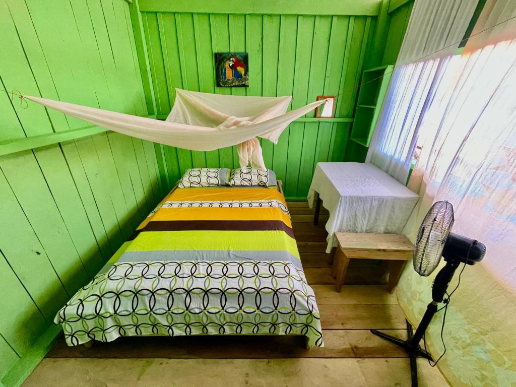Postel nebo postele na pokoji v ubytování Maloca Barü