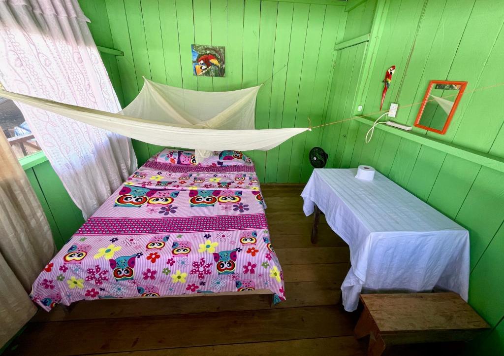 Postel nebo postele na pokoji v ubytování Maloca Barü