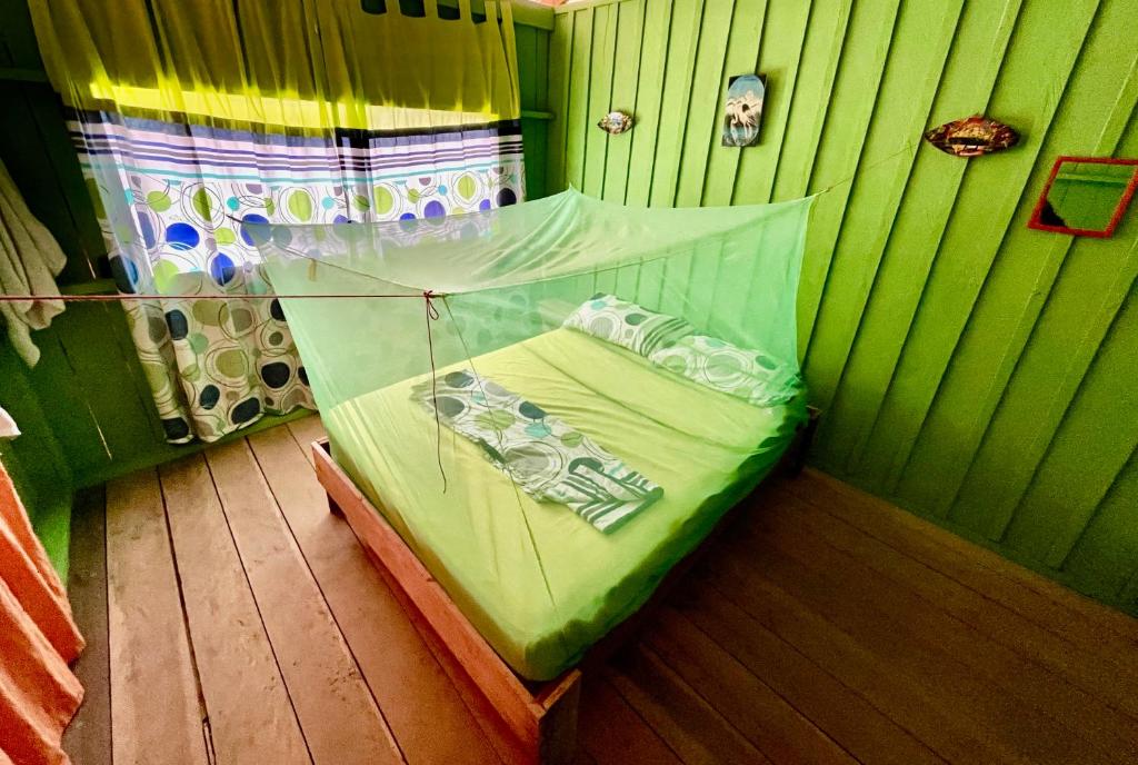 Postel nebo postele na pokoji v ubytování Maloca Barü