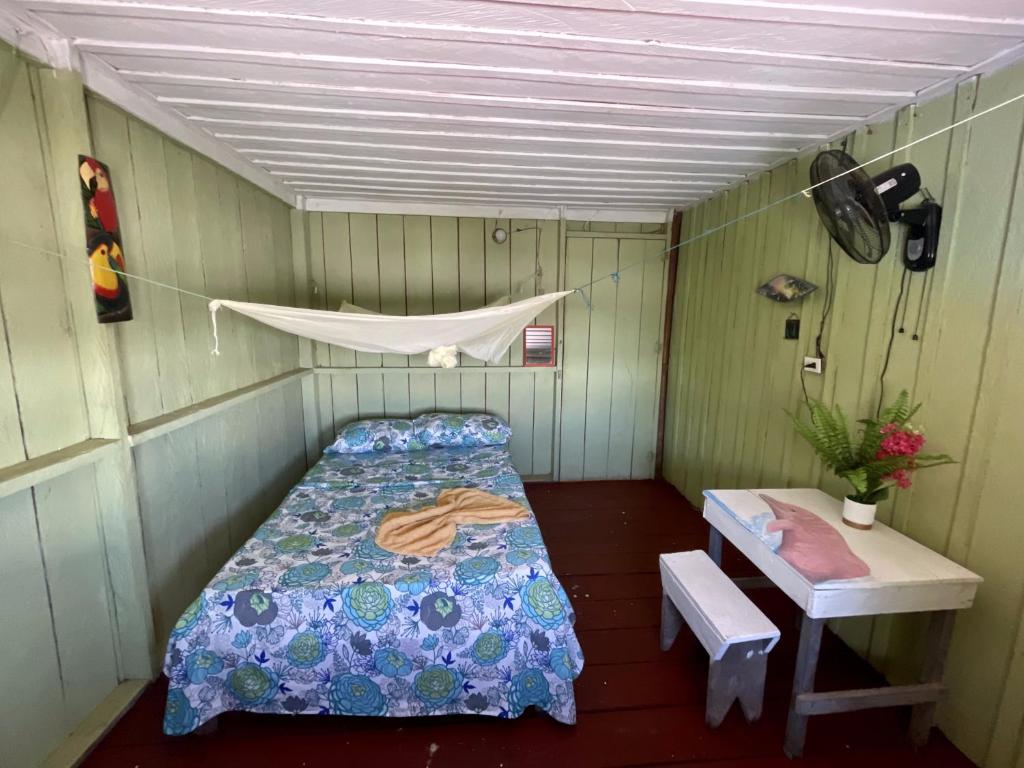 Postel nebo postele na pokoji v ubytování Maloca Barü
