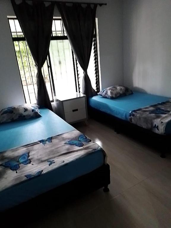 Postel nebo postele na pokoji v ubytování BONITA Y CÓMODA CASA DE 3 HABITACIONES EN cONJUNTO