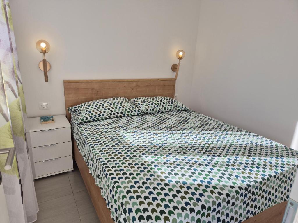 Posteľ alebo postele v izbe v ubytovaní Nova Apartments