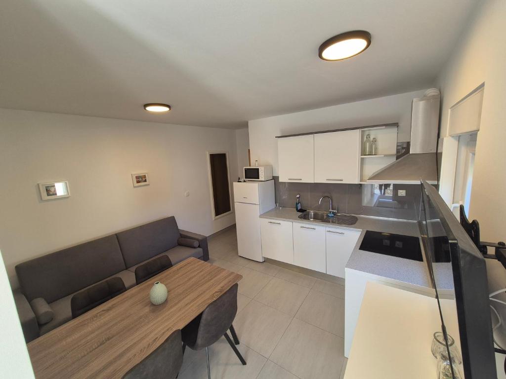 Kuchyňa alebo kuchynka v ubytovaní Nova Apartments