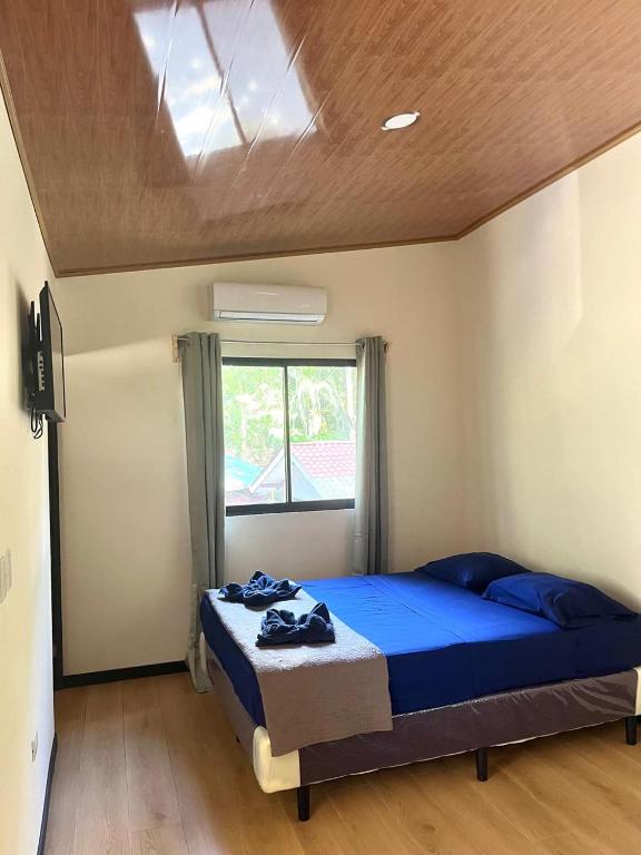 Postel nebo postele na pokoji v ubytování Bambutel Cocles