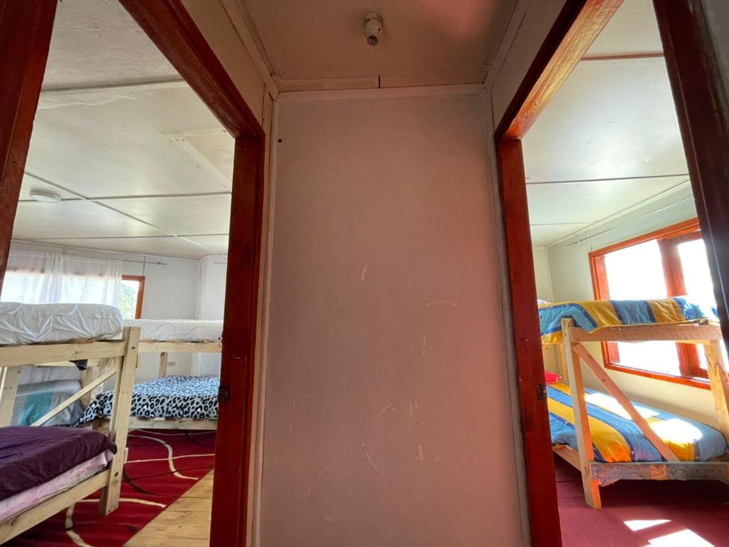 Postel nebo postele na pokoji v ubytování Baguales Patagonia
