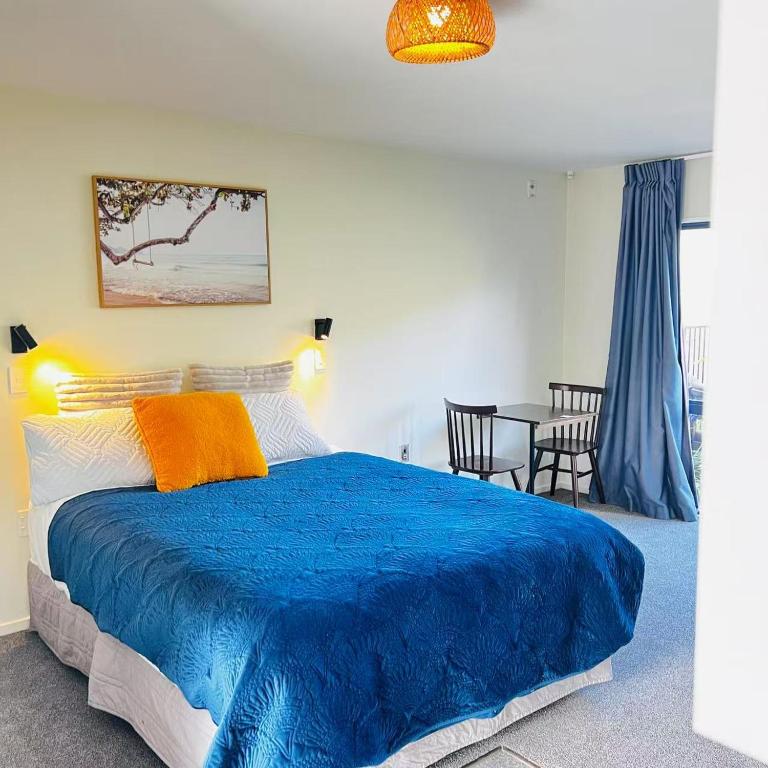 Postel nebo postele na pokoji v ubytování AAA Northlands Motel