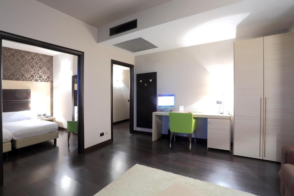 Postel nebo postele na pokoji v ubytování Hotel La Torretta