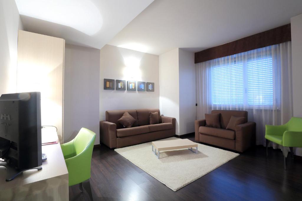 Posezení v ubytování Hotel La Torretta