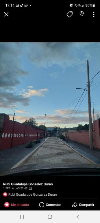 a screenshot of a picture of an empty road at Quinta Rubi in Las Rosas