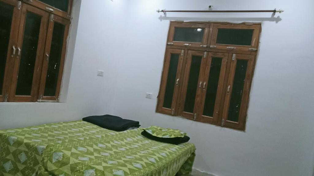 Katil atau katil-katil dalam bilik di House Stay