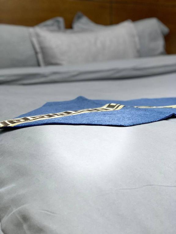 Ein Bett oder Betten in einem Zimmer der Unterkunft Amir Palace Hotel