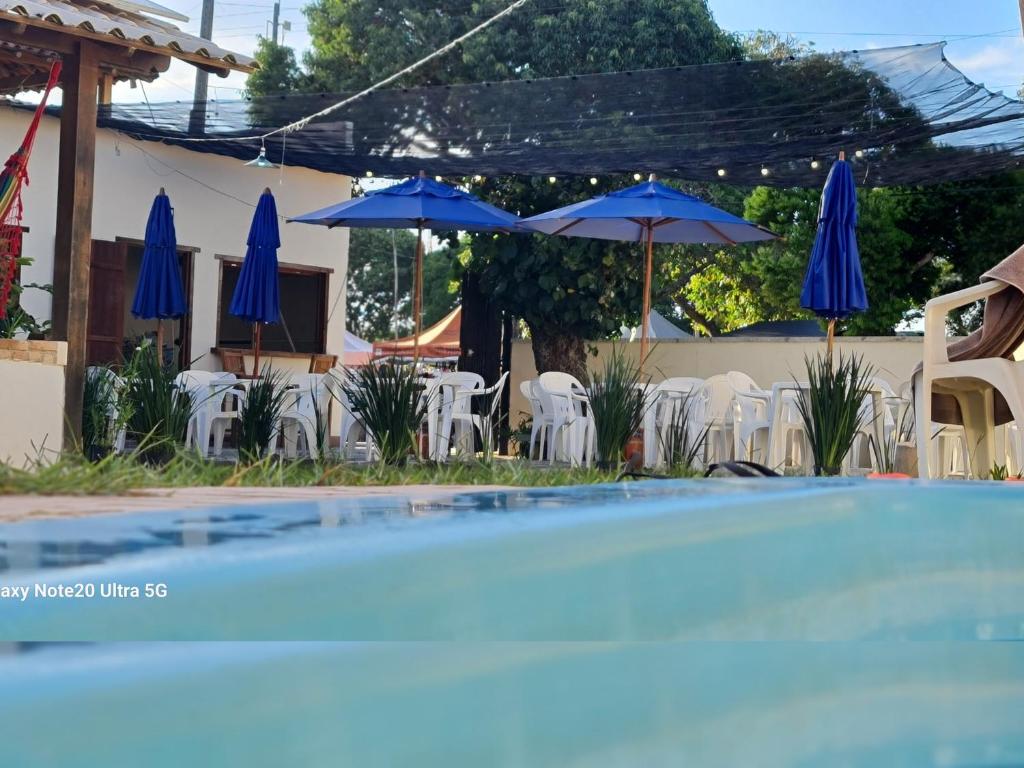 Bazén v ubytování Pousada Dunas - Suítes com HIDROMASSAGEM no coração da Vila nebo v jeho okolí