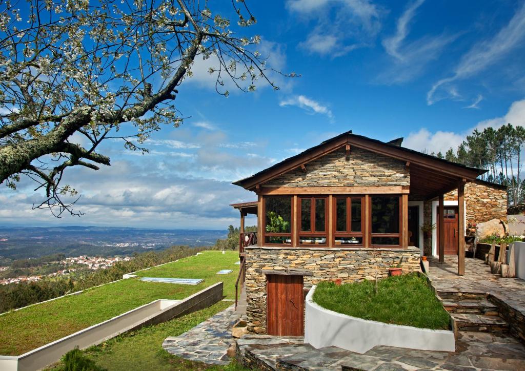 a stone house with a view at 12 Meses Naturalmente in Cerdeira