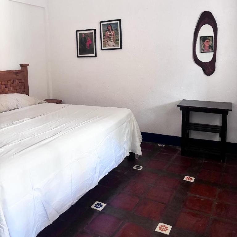 Letto o letti in una camera di Casa Bastin